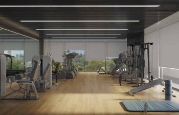 Perspectiva da Academia do ONE Morro do Gavazza - Vista panorâmica de um moderno espaço de fitness com equipamentos de última geração.