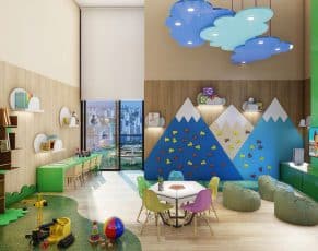 Colorida brinquedoteca do Bellagio Caminho das Árvores, com decoração temática de montanhas, área de leitura e jogos para crianças.