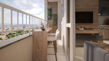 Varanda aconchegante do apartamento com vista panorâmica da cidade, decoração moderna e vegetação.