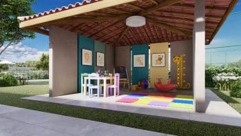 Área de recreação infantil colorida e coberta no DUO Residencial das Árvores com tapete de encaixe, mesinhas, cadeiras infantis e brinquedos.