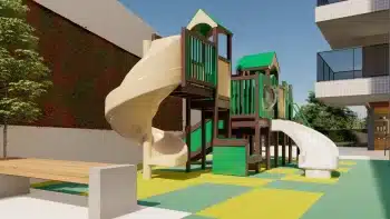 Área de parque infantil no Jaguaribe OCEAN SIDE com escorregadores coloridos, estruturas de escalada e piso de segurança emborrachado.