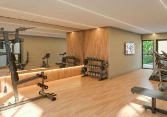 Academia moderna do Ventura Patamares com equipamentos de musculação e cardio, ambiente espaçoso, espelhos e iluminação indireta.