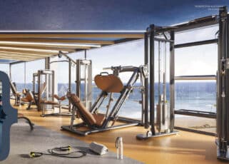 Academia moderna com equipamentos de musculação e vista panorâmica para o mar no empreendimento Terrazza Balena, em Salvador.