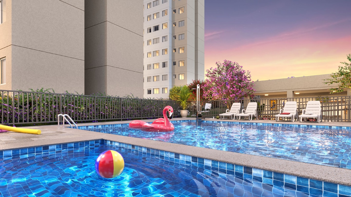 Área de piscina do Jardim Armação Prime, com design moderno, espreguiçadeiras e ambiente perfeito para relaxar ao entardecer em Salvador.