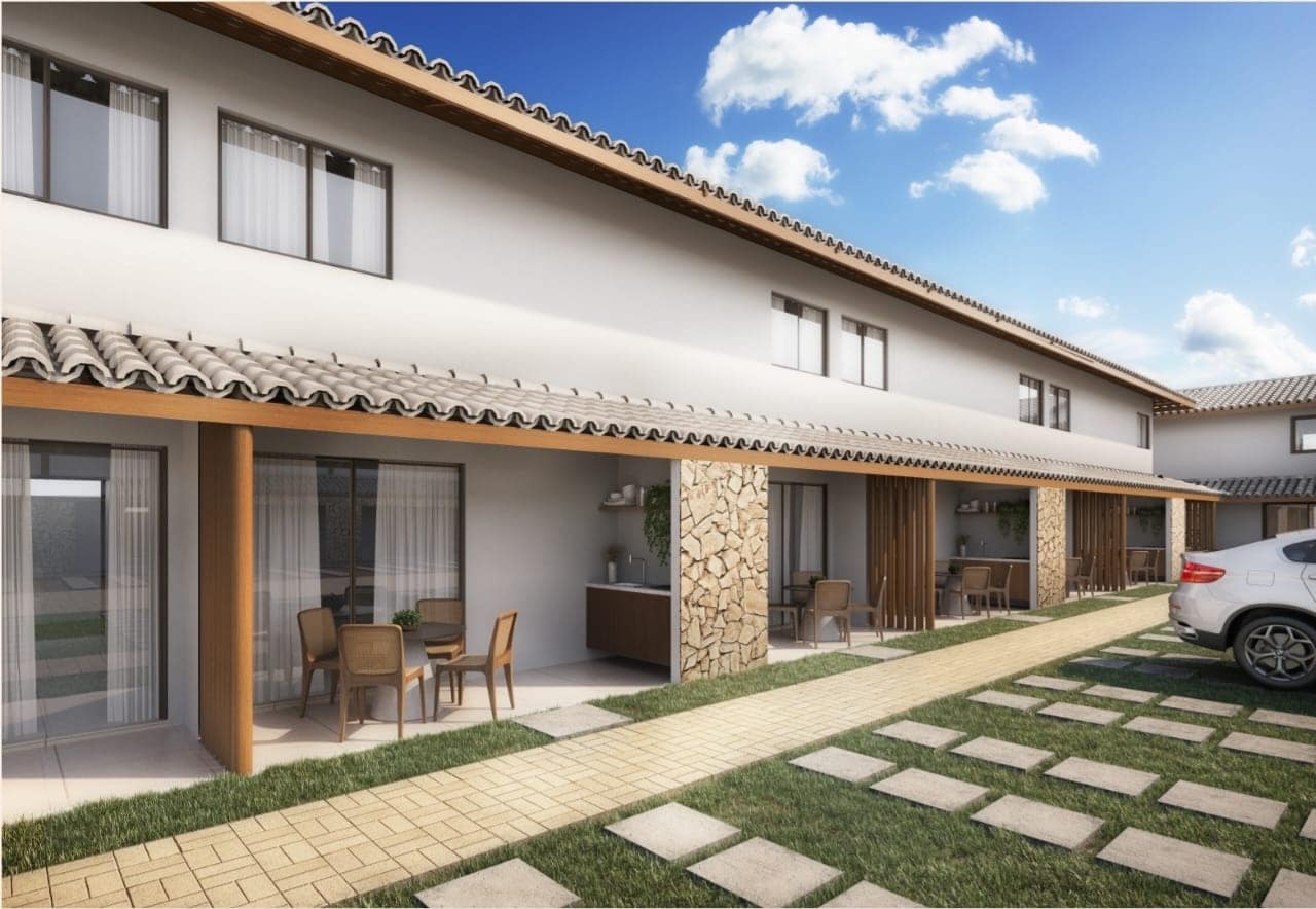 Imagem das varandas privativas do Villa Rica - Casa de Temporada, com área de convivência, bancada gourmet e estacionamento integrado ao paisagismo.