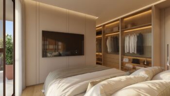 Suíte master do Elleve Horto com cama de casal, cabeceira estofada, closet iluminado com armários abertos e decoração em madeira