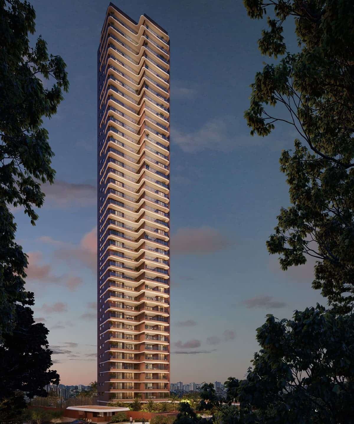 Fachada do Elleve Horto ao entardecer, com torre alta, varandas iluminadas e arquitetura contemporânea cercada por natureza