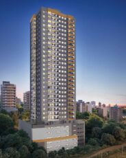 Fachada noturna do Sevilha Residencial com torre única e design contemporâneo