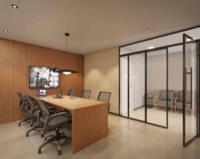Sala de reuniões equipada com mesa ampla, cadeiras ergonômicas e TV no Sevilha Residencial