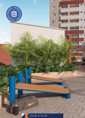 Equipamentos de ginástica na área da academia ao ar livre do Residencial Eloisio Sobral da Silveira, com paisagismo e edifício ao fundo.