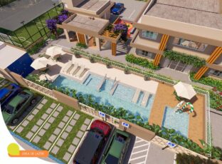 Imagem da área de lazer do Summer Barra com piscinas adulto e infantil, espreguiçadeiras, deck molhado, área gourmet e campinho ao fundo.