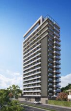 Imagem da fachada moderna do edifício Residencial Ilha de Maui em Salvador, com design vertical e linhas contemporâneas.