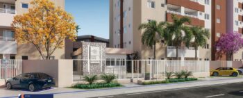 Entrada principal do Residencial Eloisio Sobral da Silveira com portaria, paisagismo, árvores floridas e fachada moderna em Aracaju/SE.