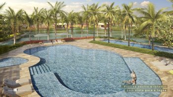 Piscina adulto e infantil do Riviera Praia do Forte com vista para a lagoa, rodeada por palmeiras e área de descanso com espreguiçadeiras.