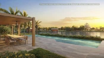 Piscina com borda infinita do Riviera Praia do Forte, integrada a um espaço gourmet moderno, com vista para a lagoa e cercada por natureza.