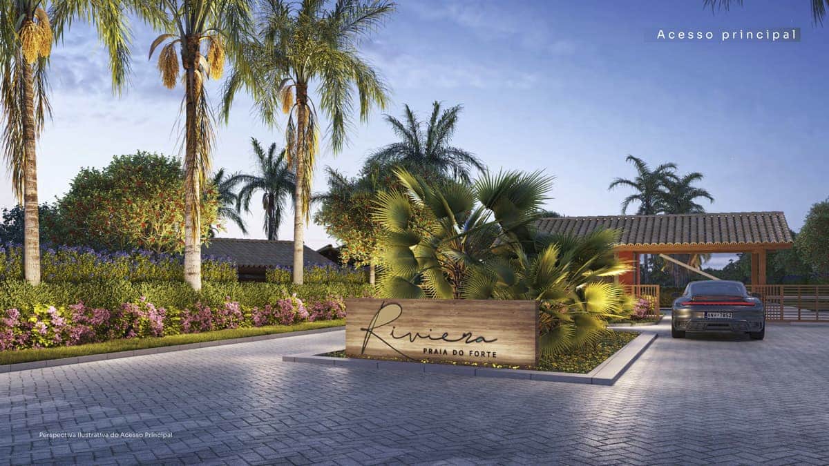 Entrada principal do Riviera Praia do Forte, com portaria moderna, paisagismo tropical e segurança exclusiva para moradores e visitantes.