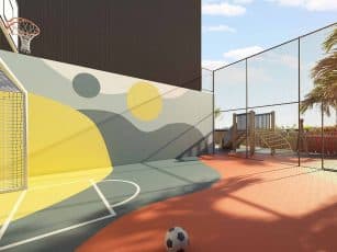 Perspectiva da quadra infantil do NEST Rio Vermelho, espaço de lazer com estrutura para jogos, esportes e brincadeiras ao ar livre.