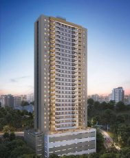 Fachada iluminada do Residencial Florença ao entardecer, mostrando o edifício moderno com varandas e vista para a cidade de Salvador.