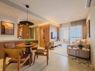 Living do apartamento de 2 quartos do Residencial Florença com sala integrada, decoração moderna e varanda iluminada.