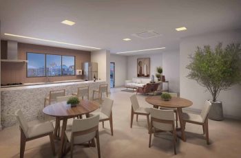 Lounge Festas do Residencial Florença com cozinha americana, mesas de madeira e decoração moderna em Salvador.