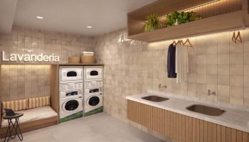 Lavanderia do Gal Urban Beach Living equipada com máquinas modernas, bancadas e área de apoio para moradores