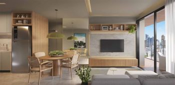 Living do apartamento com 2 suítes do Lumio Jardim Apipema em Salvador (Aptos 101 a 2201, 105 a 2205), com sala integrada à varanda e vista panorâmica.