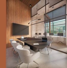 Coworking com sala de reunião do Lumio Jardim Apipema em Salvador, com mesa ampla, cadeiras ergonômicas e iluminação natural.