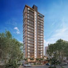 Fachada principal do Vivid Pituba, torre residencial alta com varandas amplas e design contemporâneo