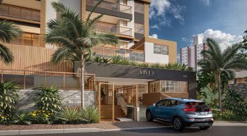 Fachada do Vivid Pituba com acesso principal, paisagismo e design moderno