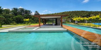 Piscinas adulto e infantil com área de hidromassagem do Reserva Byom, cercadas por natureza e deck em madeira.