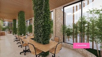 Coworking do Yu Corsário Smart Hub com mesas compartilhadas, iluminação natural e paisagismo integrado na nova orla de Salvador.