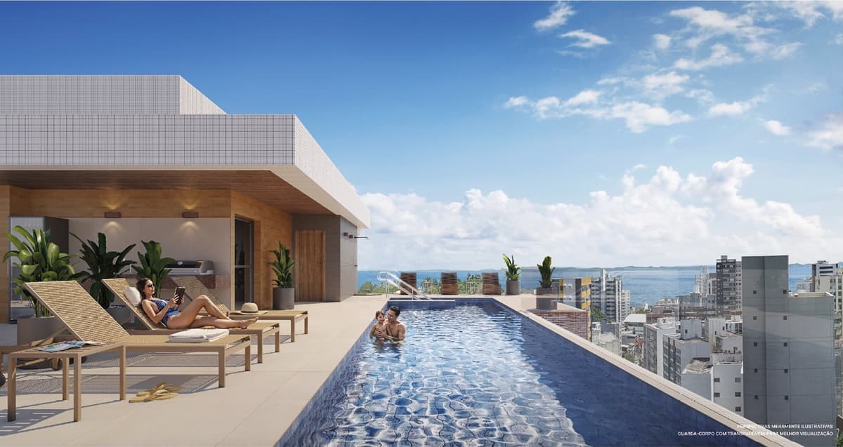 Piscina no rooftop do OCEAN Jardim Brasil, com área de lazer elevada e vista aberta para o mar e para a Barra, em Salvador.
