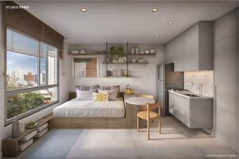 Studio prime do OCEAN Jardim Brasil, com dormitório integrado à cozinha, mesa de apoio e iluminação natural na Barra, em Salvador.