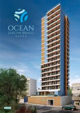 Fachada do OCEAN Jardim Brasil, torre residencial com varandas e base com acesso controlado no bairro Jardim Brasil, na Barra, em Salvador.