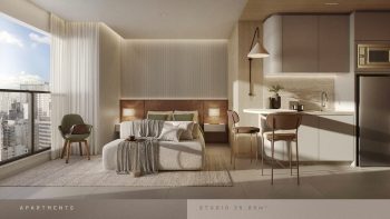 Studio do Beach Class Bahia com cama integrada, cozinha compacta, bancada para refeições e vista urbana.