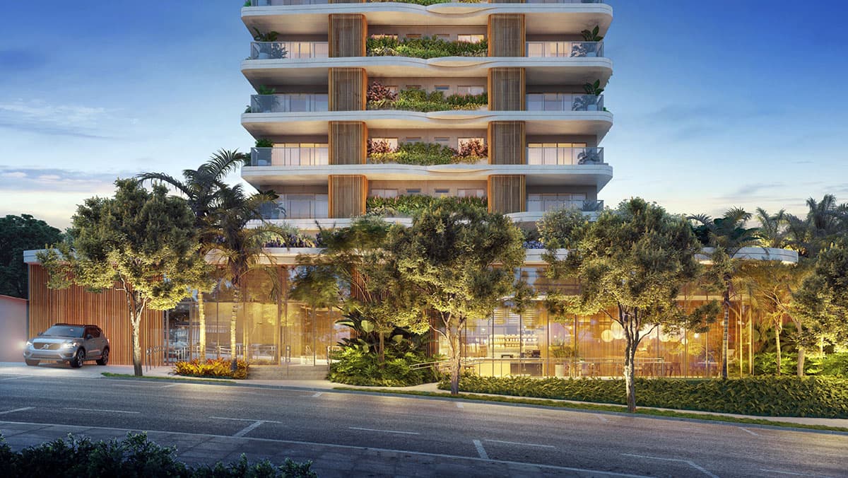 Fachada imponente e integrada ao verde no Bosque Caminho das Árvores Fachada do Bosque Caminho das Árvores com paisagismo exuberante, iluminação cênica e varandas com vegetação.