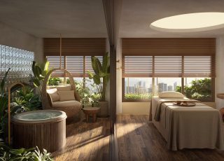 Ambiente de relaxamento com ofurô, poltrona aconchegante e sala de massagem com vista para a cidade.
