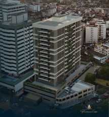 Vista aérea do edifício Flamiano Costa na Vila Laura, com fachada moderna, varandas e entorno urbano em Salvador