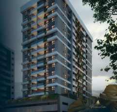 Fachada do edifício Flamiano Costa com varandas modernas e iluminação noturna na Vila Laura em Salvador