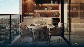 Varanda gourmet do Flamiano Costa com mesa, churrasqueira e vista para a cidade na Vila Laura