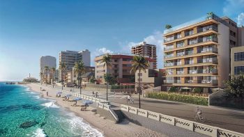 Perspectiva artística da fachada do Verger Barra na orla da Barra, com praia, calçadão, coqueiros e edifícios ao redor.